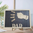 Letrero de madera personalizado Puños de papá